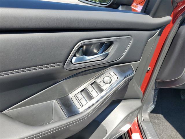 Photo of 2025 Scarlet Ember Tintcoat Nissan Rogue