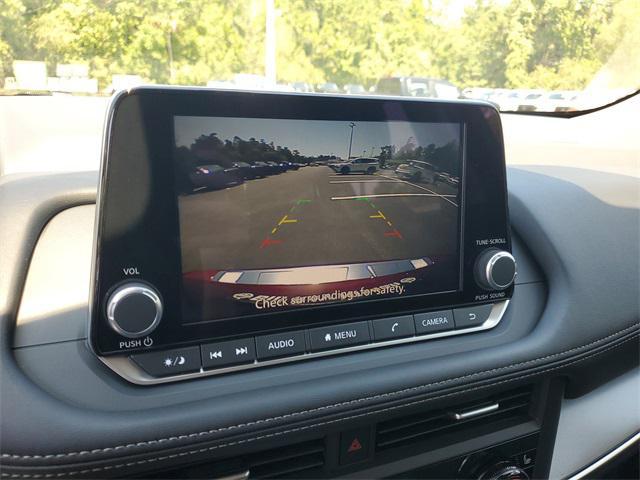 Photo of 2025 Scarlet Ember Tintcoat Nissan Rogue