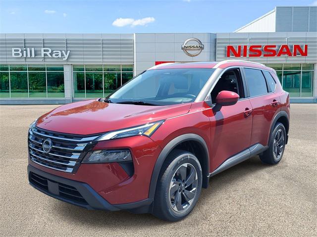 Photo of 2025 Scarlet Ember Tintcoat Nissan Rogue