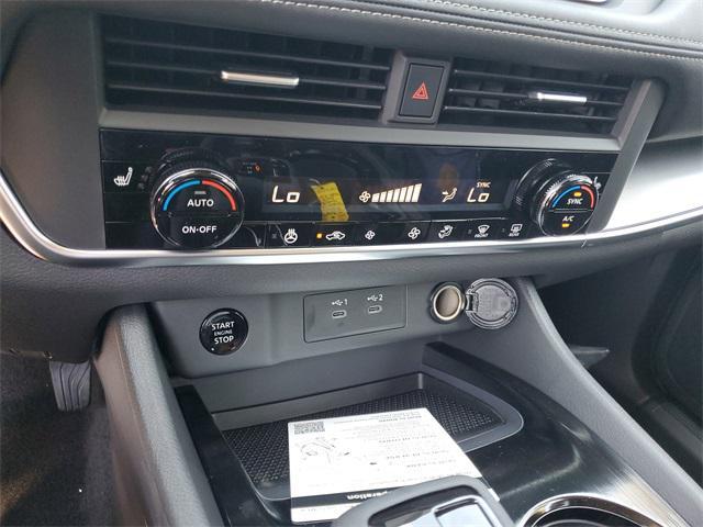 Photo of 2025 Scarlet Ember Tintcoat Nissan Rogue