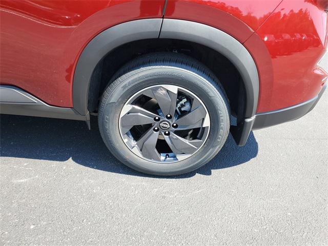 Photo of 2025 Scarlet Ember Tintcoat Nissan Rogue
