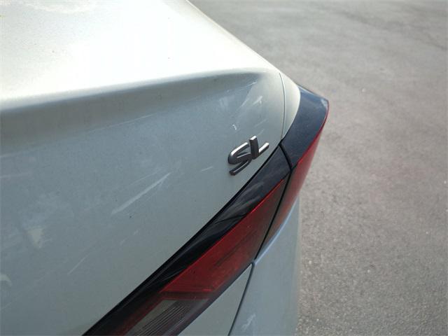 Photo of 2025 Pearl White Tricoat Nissan Altima