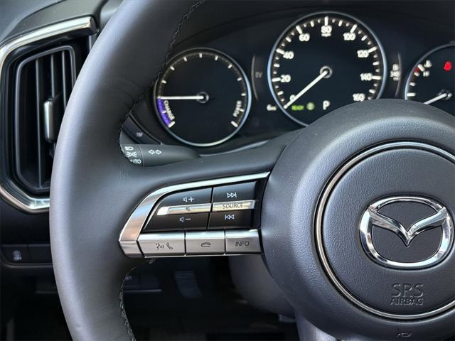 Photo of 2025 wind chill pearl Mazda CX-50 Hybrid
