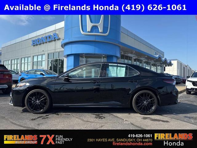 Photo of 2024 Midnight Black Metallic Toyota Camry