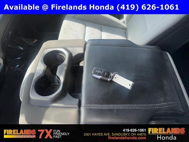 Photo of 2023 Patriot Blue Pearlcoat RAM 1500