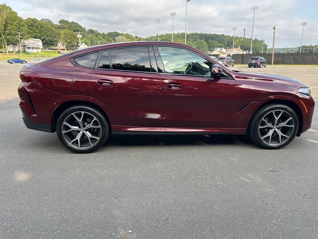 Photo of 2024 Aventurin Red Metallic BMW X6