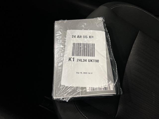 Photo of 2024 Garnet Pearl Metallic Nissan Altima