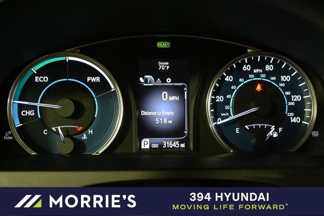 Photo of 2016 Celestial Silver Metallic Toyota Camry Hybrid