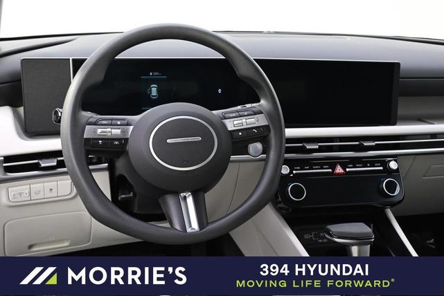 Photo of 2025 White Pearl Hyundai TUCSON