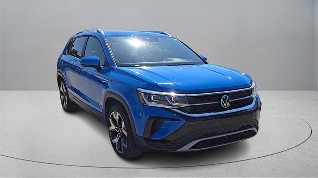 Photo of 2022 Cornflower Blue Volkswagen Taos