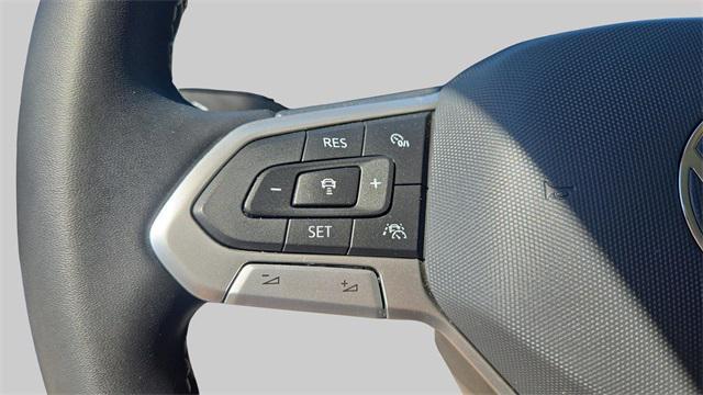Photo of 2022 Cornflower Blue Volkswagen Taos