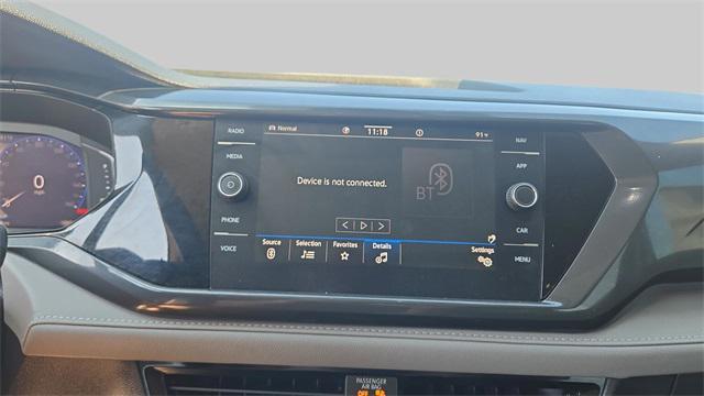 Photo of 2022 Cornflower Blue Volkswagen Taos