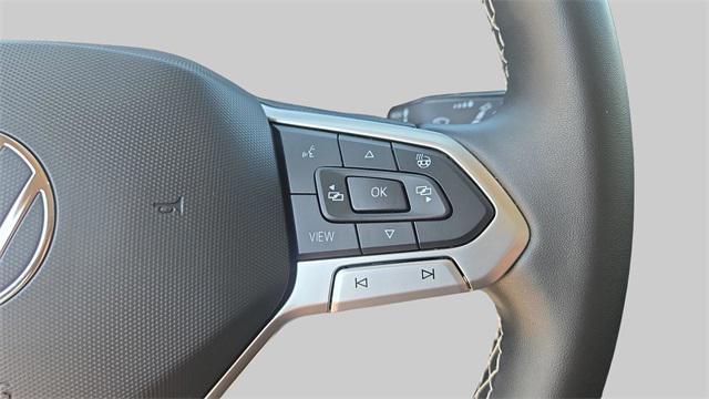 Photo of 2022 Cornflower Blue Volkswagen Taos
