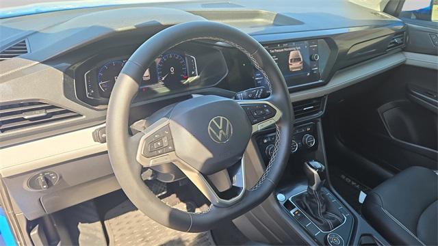 Photo of 2022 Cornflower Blue Volkswagen Taos