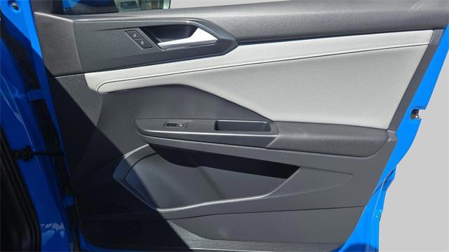 Photo of 2022 Cornflower Blue Volkswagen Taos