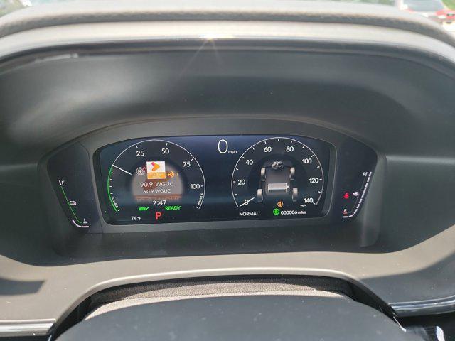 Photo of 2026 Solar Silver Metallic Honda CR-V Hybrid