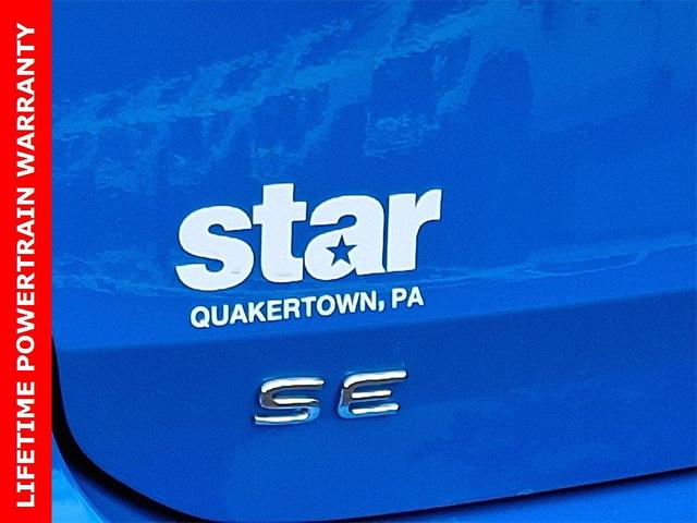 Photo of 2025 Cornflower Blue W/Black Roof Volkswagen Taos