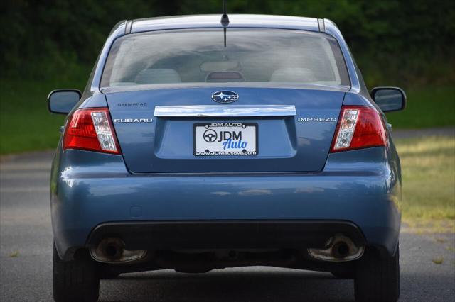 Photo of 2009 Blue Subaru Impreza