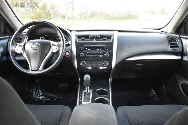 Photo of 2014 Cayenne Red Metallic Nissan Altima