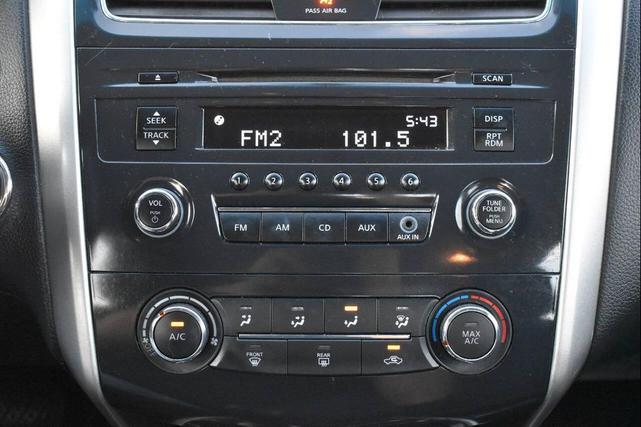 Photo of 2014 Cayenne Red Metallic Nissan Altima