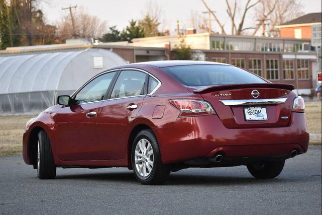 Photo of 2014 Cayenne Red Metallic Nissan Altima