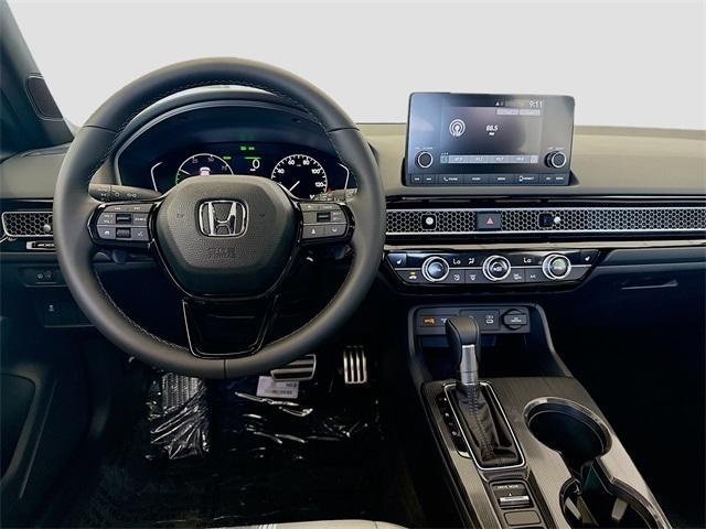 Photo of 2025 Meteorite Gray Metallic Honda Civic Hybrid