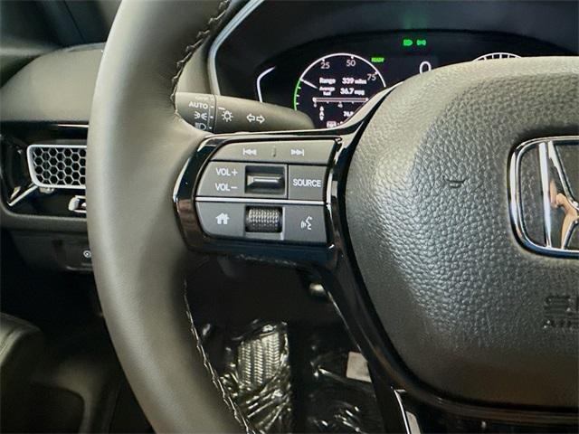 Photo of 2025 Meteorite Gray Metallic Honda Civic Hybrid