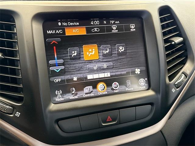 Photo of 2015 Eco Green Pearlcoat Jeep Cherokee