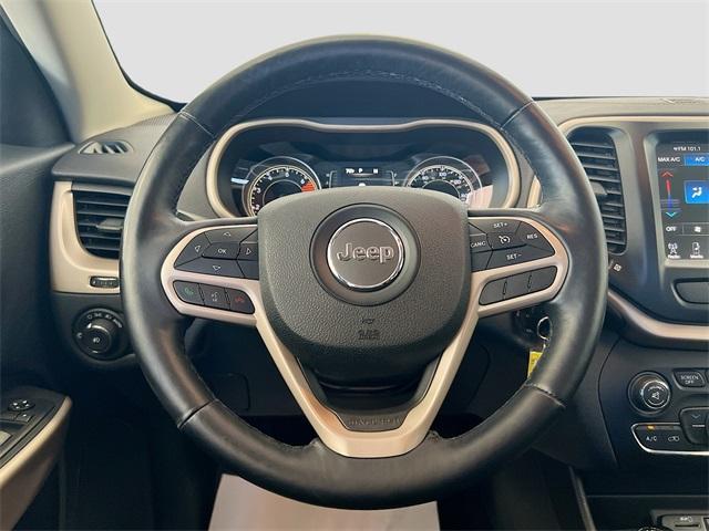 Photo of 2017 Deep Cherry Red Crystal Pearlcoat Jeep Cherokee