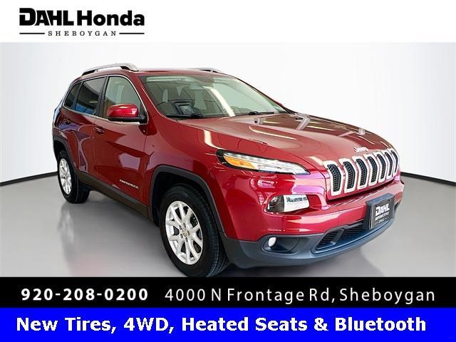 Photo of 2017 Deep Cherry Red Crystal Pearlcoat Jeep Cherokee
