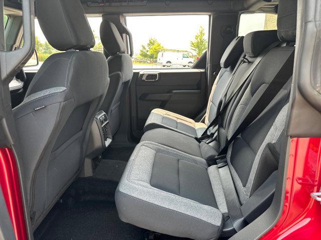Photo of 2025 Ruby Red Metallic Tinted Clearcoat Ford Bronco
