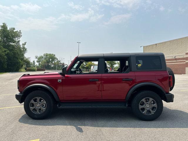 Photo of 2025 Ruby Red Metallic Tinted Clearcoat Ford Bronco