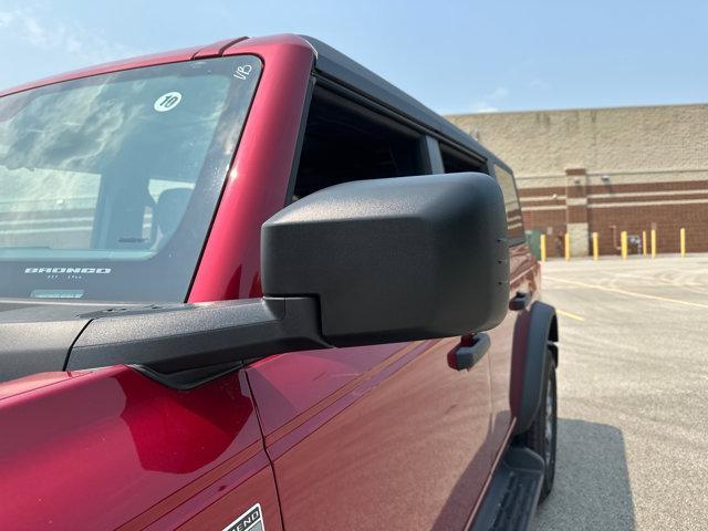 Photo of 2025 Ruby Red Metallic Tinted Clearcoat Ford Bronco