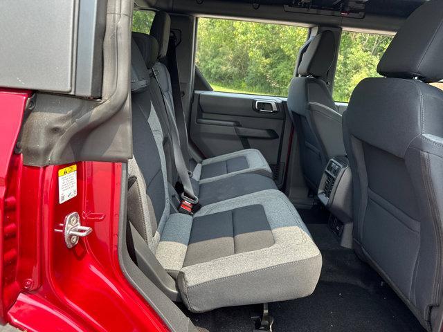 Photo of 2025 Ruby Red Metallic Tinted Clearcoat Ford Bronco