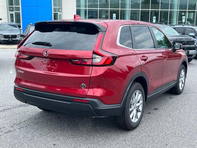 Photo of 2026 Radiant Red Metallic Honda CR-V