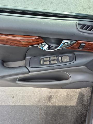 Photo of 2005 Blue Ice Cadillac DeVille