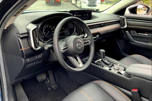 Photo of 2024 Ingot Blue Metallic Mazda CX-50