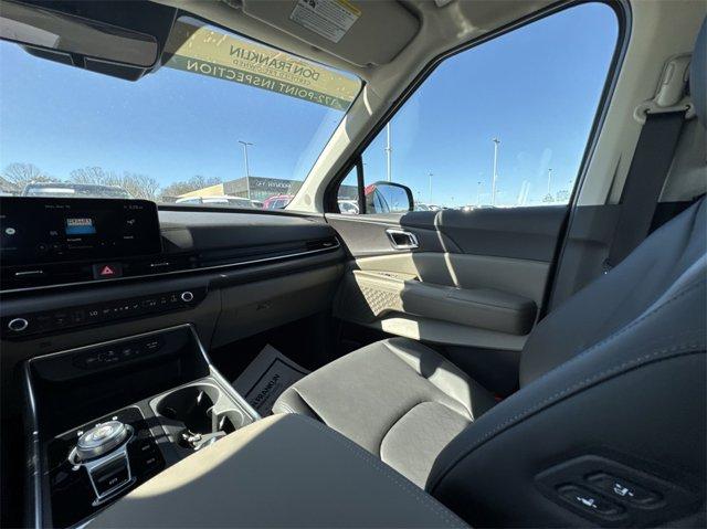 Photo of 2025 Flare Red Kia Carnival Hybrid