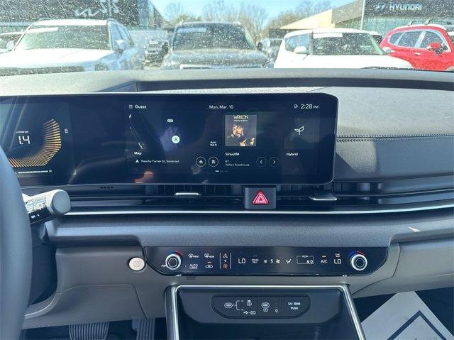 Photo of 2025 Flare Red Kia Carnival Hybrid