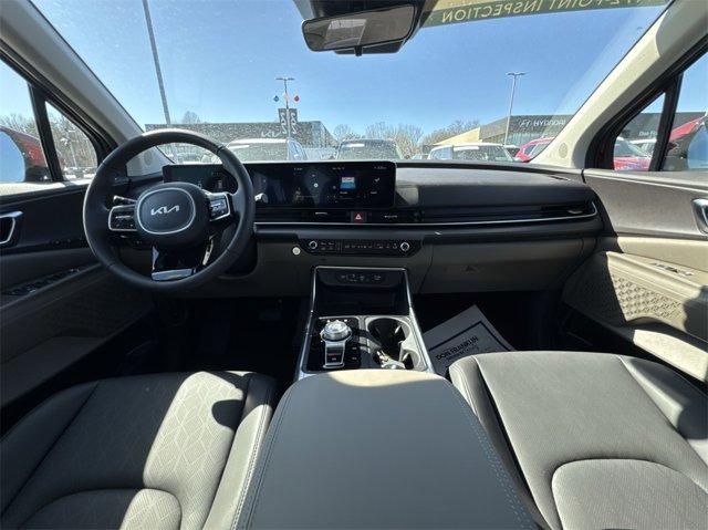 Photo of 2025 Flare Red Kia Carnival Hybrid
