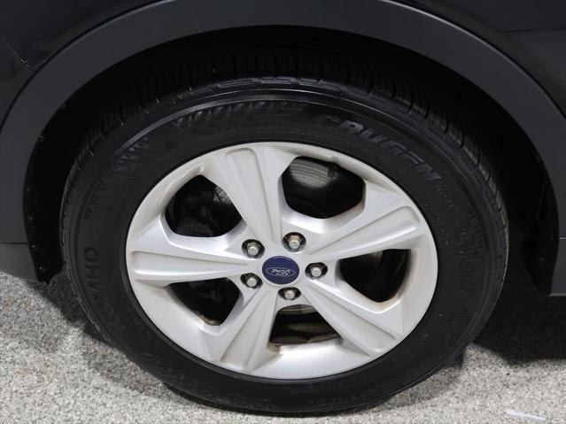 Photo of 2014 Tuxedo Black Ford Escape