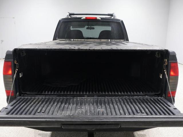Photo of 2003 Super Black Nissan Frontier