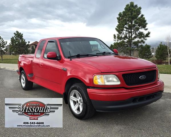 Photo of 2000 Red Ford F-150