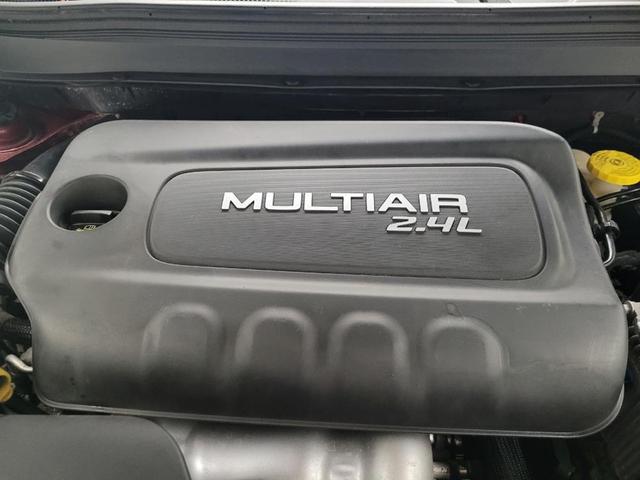 Photo of 2014 Deep Cherry Red Crystal Pearlcoat Jeep Cherokee