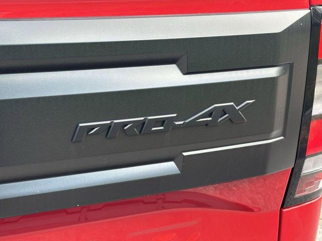 Photo of 2025 Red Alert Nissan Frontier