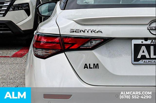 Photo of 2025 Aspen White Tricoat/Super Black Nissan Sentra