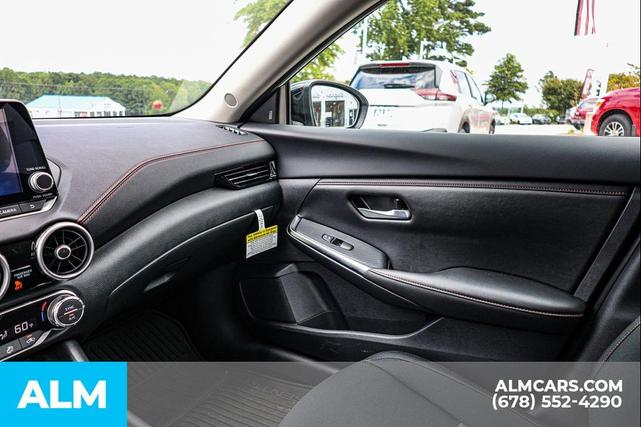 Photo of 2025 Aspen White Tricoat/Super Black Nissan Sentra