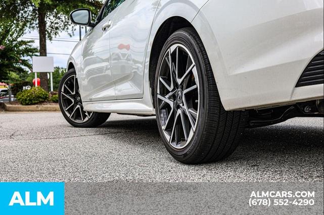 Photo of 2025 Aspen White Tricoat/Super Black Nissan Sentra