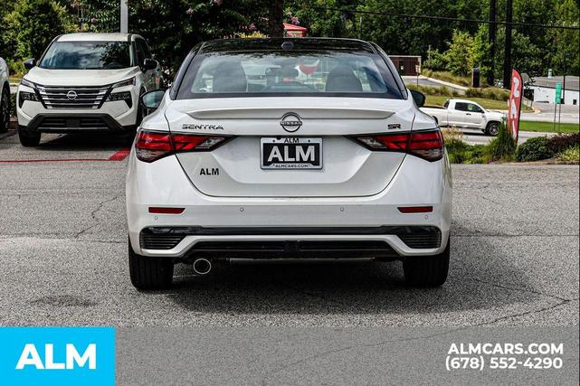 Photo of 2025 Aspen White Tricoat/Super Black Nissan Sentra