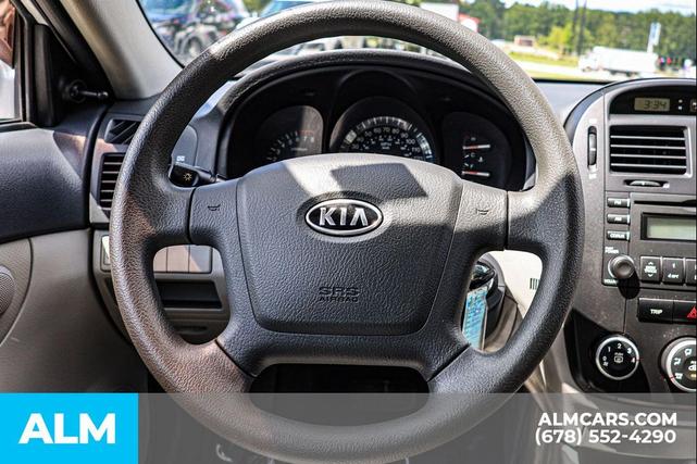 Photo of 2009 Bright Silver Kia Spectra
